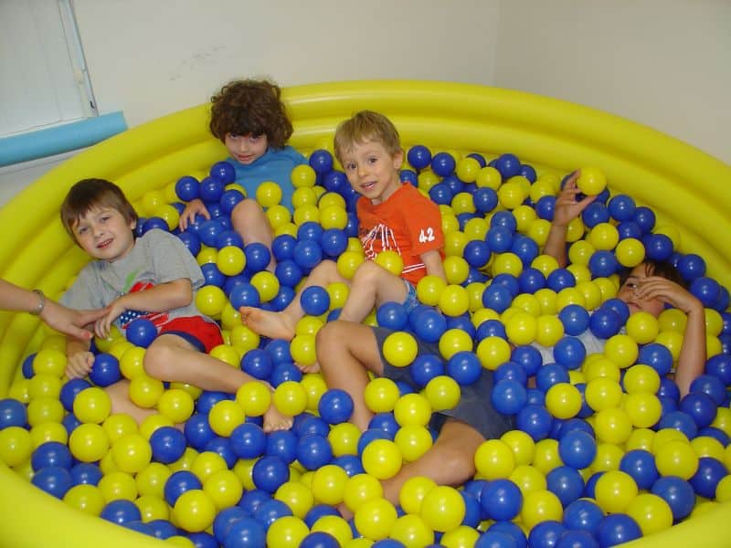 kids playing in ball pit